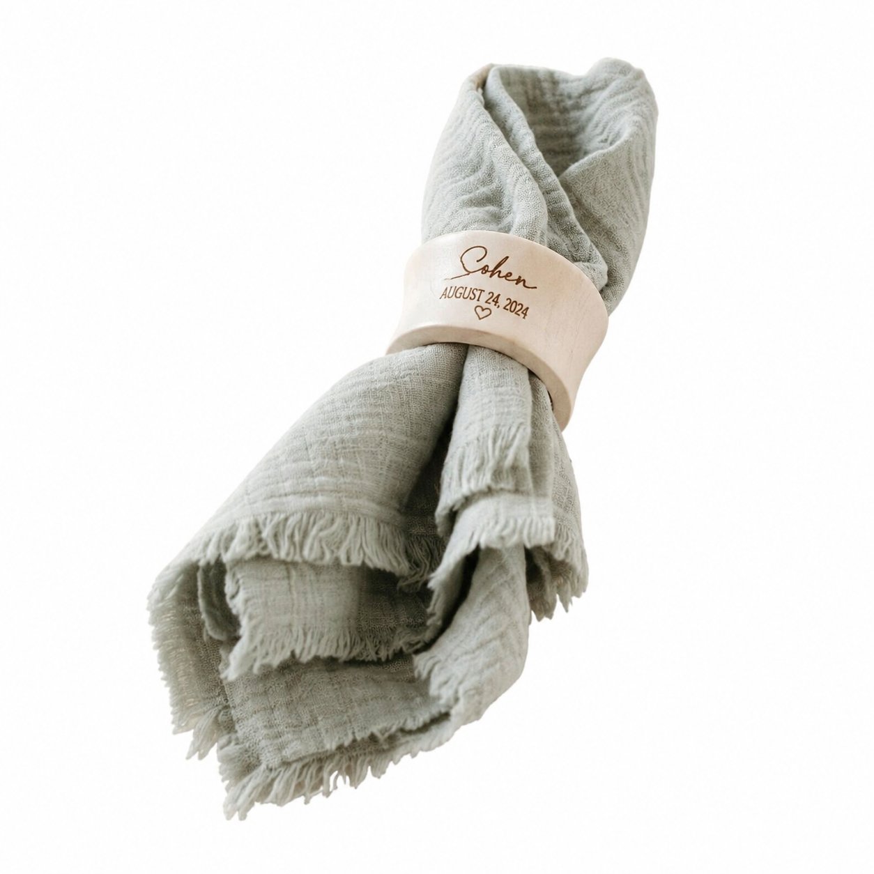 Serviettenring mit heller Stoffserviette, freigestellt
